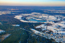 Village view in snow in winter from the southwest in Neuburg am Rhein in the state Rhineland-Palatinate, Germany