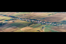 Panoramic perspective Village - view on the edge of agricultural fields and farmland in Vollmersweiler in the state Rhineland-Palatinate, Germany