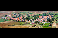 Village - view on the edge of agricultural fields and farmland in Hunspach in Grand Est, France