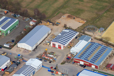 Oblique view of Am Gäxwald industrial park with transparent packaging Weber GmbH, REGAB GmbH civil engineering and Feinwerk precision and measuring technology GmbH & Co. KG in Herxheim bei Landau in the state Rhineland-Palatinate, Germany