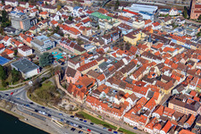 Historic city wall at the Fischerbrunnen and playground at the Pulverturm in Eberbach in the state Baden-Wuerttemberg, Germany