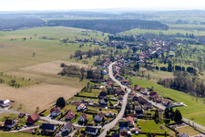 Village - view on the edge of agricultural fields and farmland in Struth in Grand Est, France