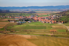 Aerial view of Village - view on the edge of agricultural fields and farmland in Kirrwiller in Grand Est, France