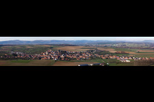 Panoramic perspective Village - view on the edge of agricultural fields and farmland in Mietesheim in Grand Est, France
