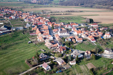 Village - view on the edge of agricultural fields and farmland in Forstheim in Grand Est, France