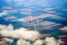 Wind turbines in clouds in Minfeld in the state Rhineland-Palatinate, Germany
