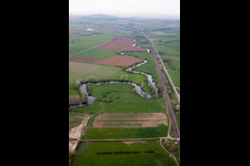 Curved loop of the riparian zones on the course of the river La Chiers in Carignan in Alsace-Champagne-Ardenne-Lorraine, France