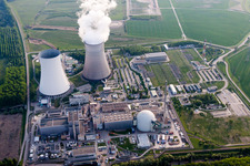 Oblique view of Clouds over the cooling tower of the NPP nuclear power plant of EnBW Kernkraft GmbH, Kernkraftwerk Philippsburg on an Island in the river rhine in Philippsburg in the state Baden-Wurttemberg, Germany