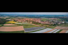 Panoramic perspective of Village - view on the edge of agricultural fields and farmland in Rheinzabern in the state Rhineland-Palatinate, Germany