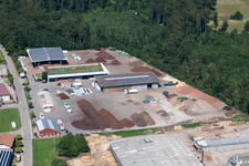 Building and production halls on the premises of corthum Nordschwarzwald GmbH - corthum Erdenwerk in the district Pfaffenrot in Marxzell in the state Baden-Wurttemberg seen from above