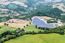 Panel rows of photovoltaic and solar farm in Cartoceto in Marche, Italy