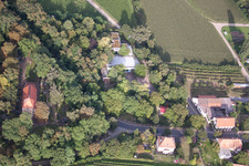 Company premises of SEKA Schutzbelüftung GmbH with halls, company buildings and production facilities in the district Wollmesheim in Landau in der Pfalz in the state Rhineland-Palatinate, Germany seen from above