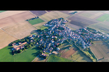 Village - view on the edge of agricultural fields and farmland in Quirnheim in the state Rhineland-Palatinate, Germany