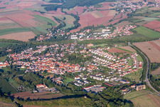 Village - view on the edge of agricultural fields and farmland in Marnheim in the state Rhineland-Palatinate, Germany