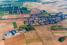 Village - view on the edge of agricultural fields and farmland in Wendelsheim in the state Rhineland-Palatinate, Germany