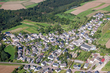Village - view on the edge of agricultural fields and farmland in Kratzenburg in the state Rhineland-Palatinate, Germany
