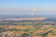 Hambach opencast mine between wind farm and lignite power plant in the district Oberzier in Niederzier in the state North Rhine-Westphalia, Germany