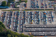 Aerial view of Parking place with new trucks on the premises of Daimler Automobilwerk Woerth in Woerth am Rhein in the state Rhineland-Palatinate, Germany