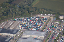 Oblique view of Daimler truck parking spaces in Wörth am Rhein in the state Rhineland-Palatinate, Germany