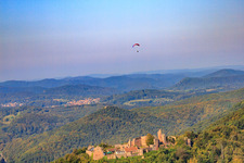Paraglider over the Madenburg in Eschbach in the state Rhineland-Palatinate, Germany
