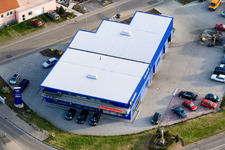 Nordring, Peugeot dealership Grün in Rülzheim in the state Rhineland-Palatinate, Germany from above