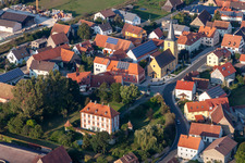 Aerial view of Buildings and parks at the mansion of the farmhouse in Sambach in the state Bavaria, Germany
