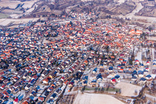 Wintry snowy Town View of the streets and houses of the residential areas in Unteroewisheim in the state Baden-Wurttemberg, Germany