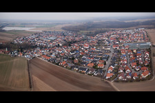 Village - view on the edge of agricultural fields and farmland in Kuhardt in the state Rhineland-Palatinate, Germany from above