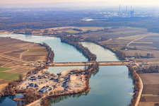 Polder dam through the quarry lake in Neupotz in the state Rhineland-Palatinate, Germany