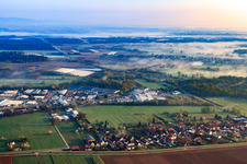 Horst industrial estate in the morning mist from the south in the district Minderslachen in Kandel in the state Rhineland-Palatinate, Germany