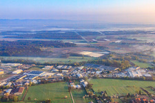 Aerial view of Horst industrial estate in the morning mist from the south in the district Minderslachen in Kandel in the state Rhineland-Palatinate, Germany