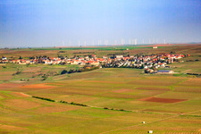 View of the village in front of the wind farm from the south in the district Dalsheim in Flörsheim-Dalsheim in the state Rhineland-Palatinate, Germany
