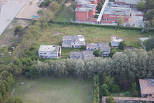 Aerial view of Dilapidated building of ex Colonia La Nostra Famiglia in Duna Verde in Venetien, Italy