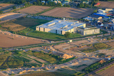 Oblique view of Nordring Industrial Estate DBK EMS GmbH & Co. KG and DBK David + Baader GmbH in Rülzheim in the state Rhineland-Palatinate, Germany