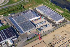 Halls and trucks of the NUSS Group in the Oberwald industrial area in Wörth am Rhein in the state Rhineland-Palatinate, Germany from above