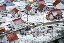 New development area NE in winter with snow in the district Schaidt in Wörth am Rhein in the state Rhineland-Palatinate, Germany from the plane