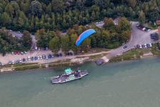 Ride a ferry ship across the Rhine in the district Neuburgweier in Au am Rhein in the state Baden-Wurttemberg, Germany