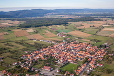 Oblique view of Village - view on the edge of agricultural fields and farmland in Uhrwiller in Grand Est, France