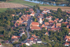 Aerial view of Church building in the village of in Kutzenhausen in Grand Est, France