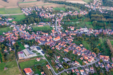 Village - view on the edge of agricultural fields and farmland in Riedseltz in Grand Est, France from above