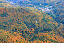 Aerial view of Autumn in the Palatinate Forest with paraglider in Waldhambach in the state Rhineland-Palatinate, Germany