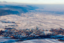 Aerial view of Wintry snowy Town View of the streets and houses of the residential areas in Siebeldingen in the state Rhineland-Palatinate, Germany