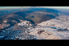 Winterly Town View of the streets and houses of the residential areas in Albersweiler in the state Rhineland-Palatinate from the plane