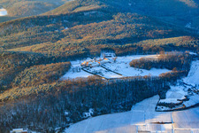 Aerial view of Liebfrauenberg Monastery in winter with snow in Bad Bergzabern in the state Rhineland-Palatinate, Germany