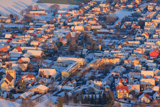 Primary school and Mundohalle in winter with snow in Minfeld in the state Rhineland-Palatinate, Germany