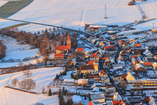 Aerial photograpy of Herrengasse in winter with snow in Minfeld in the state Rhineland-Palatinate, Germany