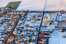 New development area in Holderbusch in winter with snow in Minfeld in the state Rhineland-Palatinate, Germany