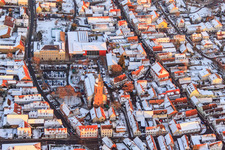 Aerial photograpy of Primary school, town hall and St. George's Church on the market square in winter with snow in Kandel in the state Rhineland-Palatinate, Germany