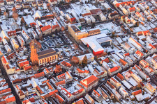Primary school, town hall and St. George's Church on the market square in winter with snow in Kandel in the state Rhineland-Palatinate, Germany out of the air