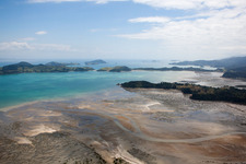 Water surface at the seaside McGregor Bay in the district Coromandel in Wyuna Bay in Waikato, New Zealand